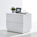 Comodino dalle linee essenziali con due cassetti, colore bianco